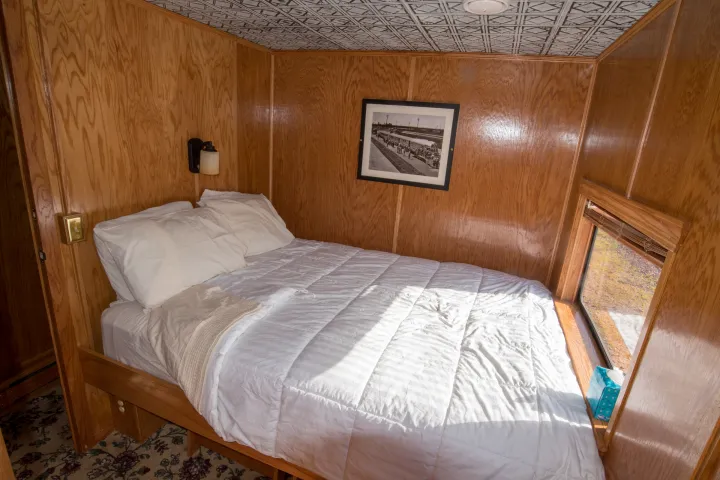 a large bed sitting in a room