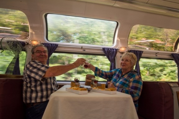 a train cake sitting on top of a car window