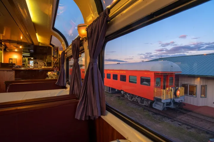 a large long train on a steel track