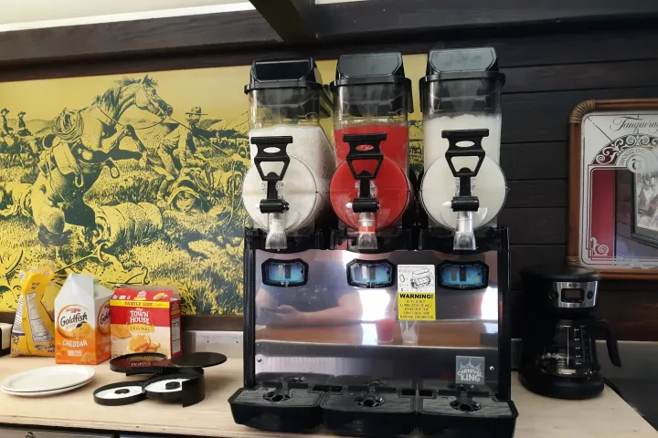 a stack of flyers on a table